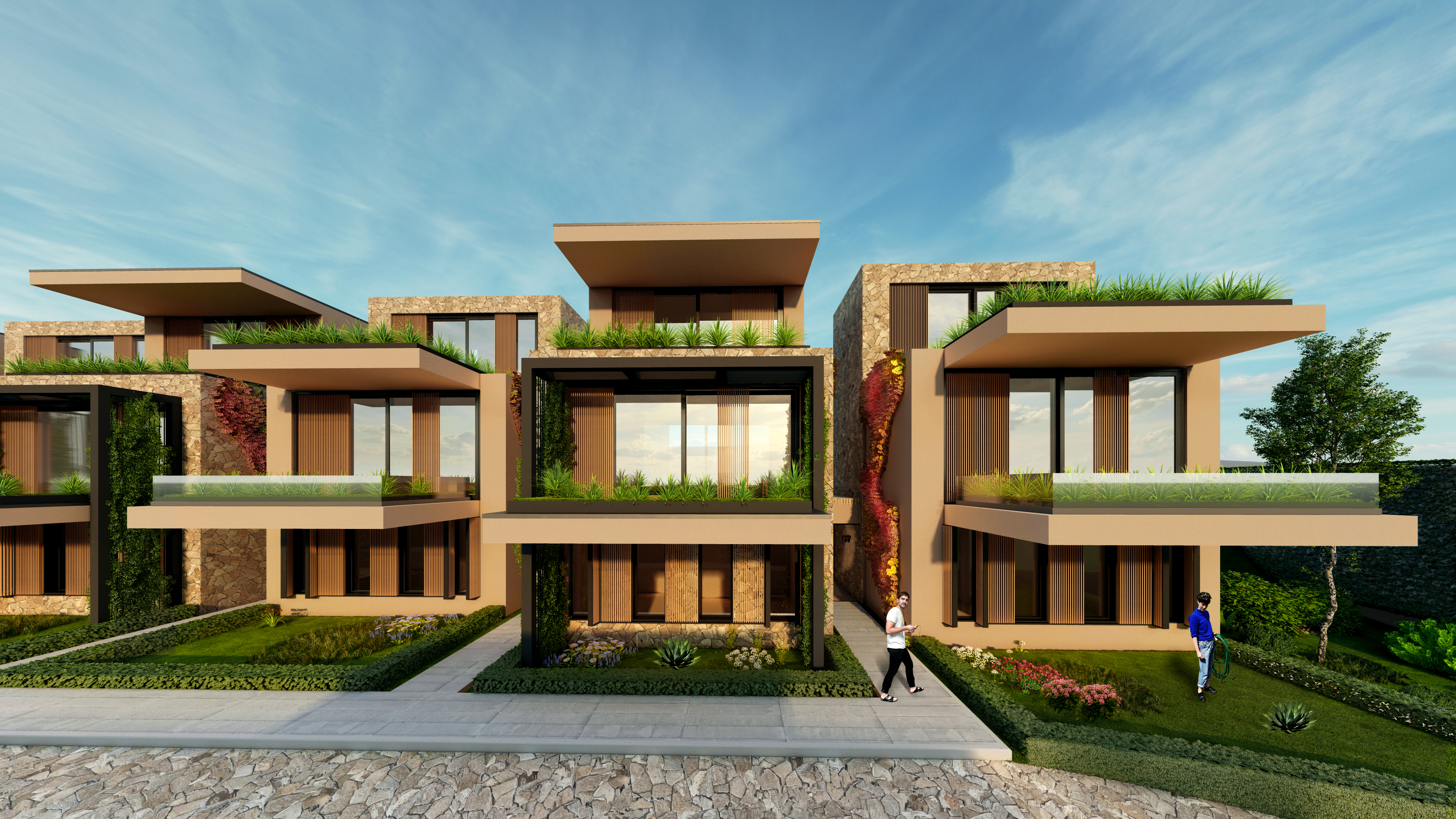 Senia Residence villas stepping down the Dhërmi hillside, angled timber roofs above terraces of red bougainvillea