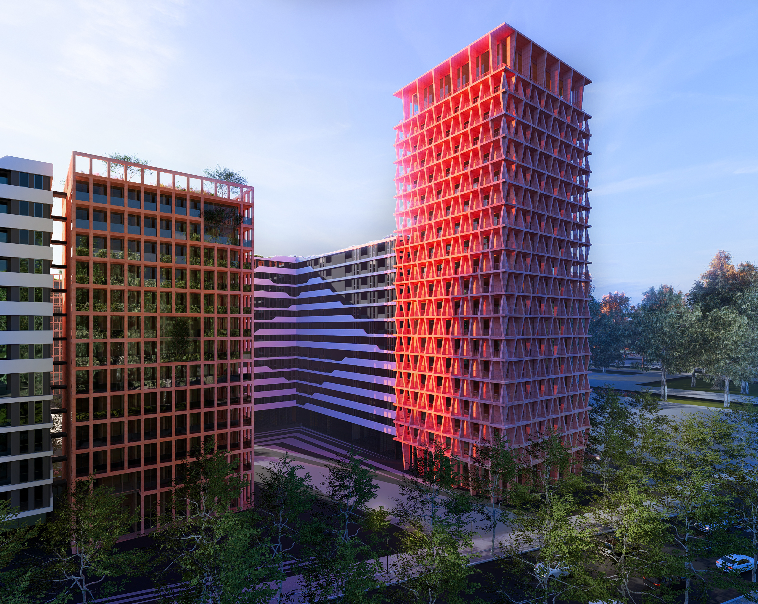 Aerial dusk view of Cornelian Residence in Vora, the red tower lit above stepped blocks and planted terraces