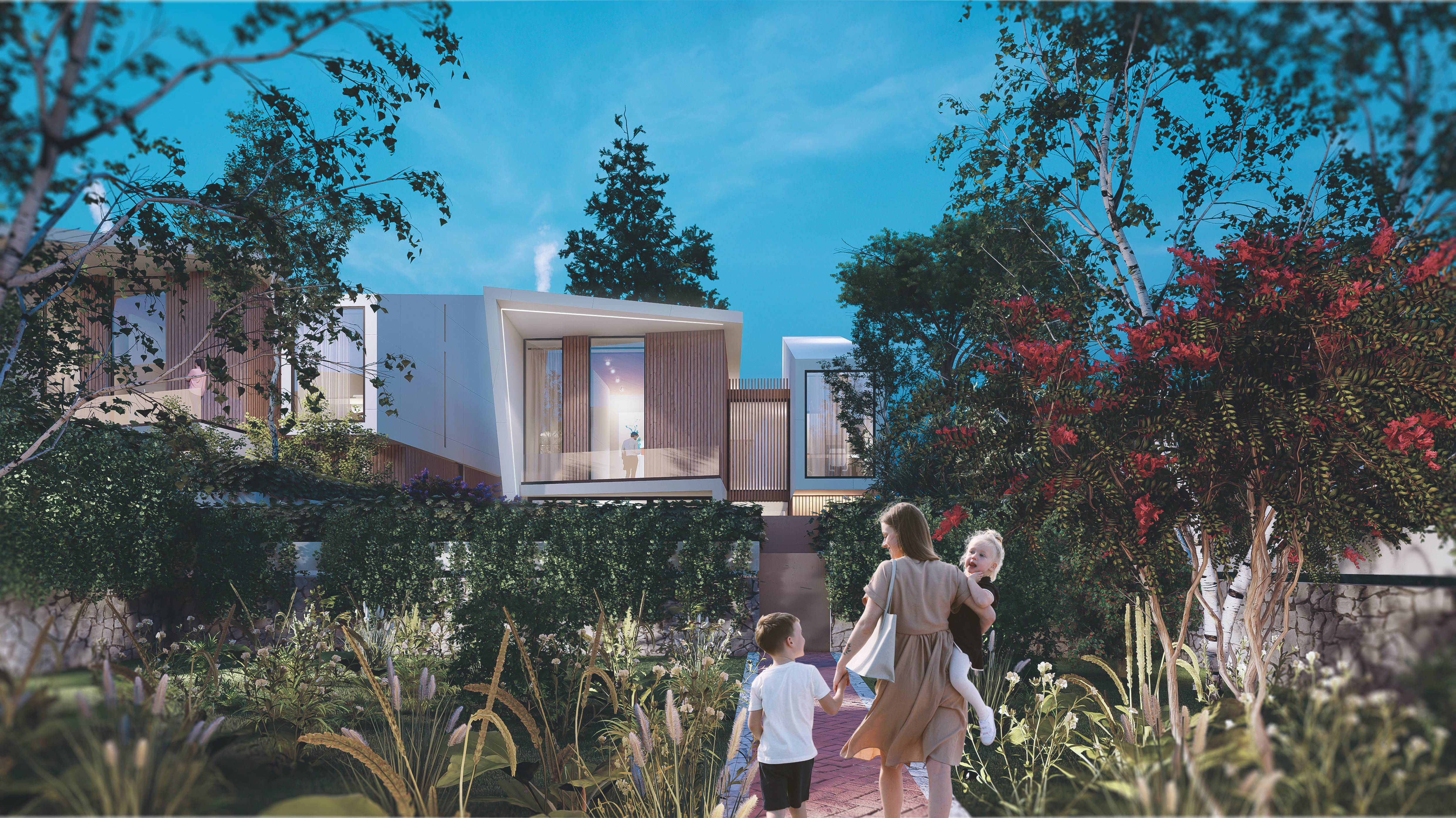 A family walking the planted path between the Perla Garden houses in Tirana