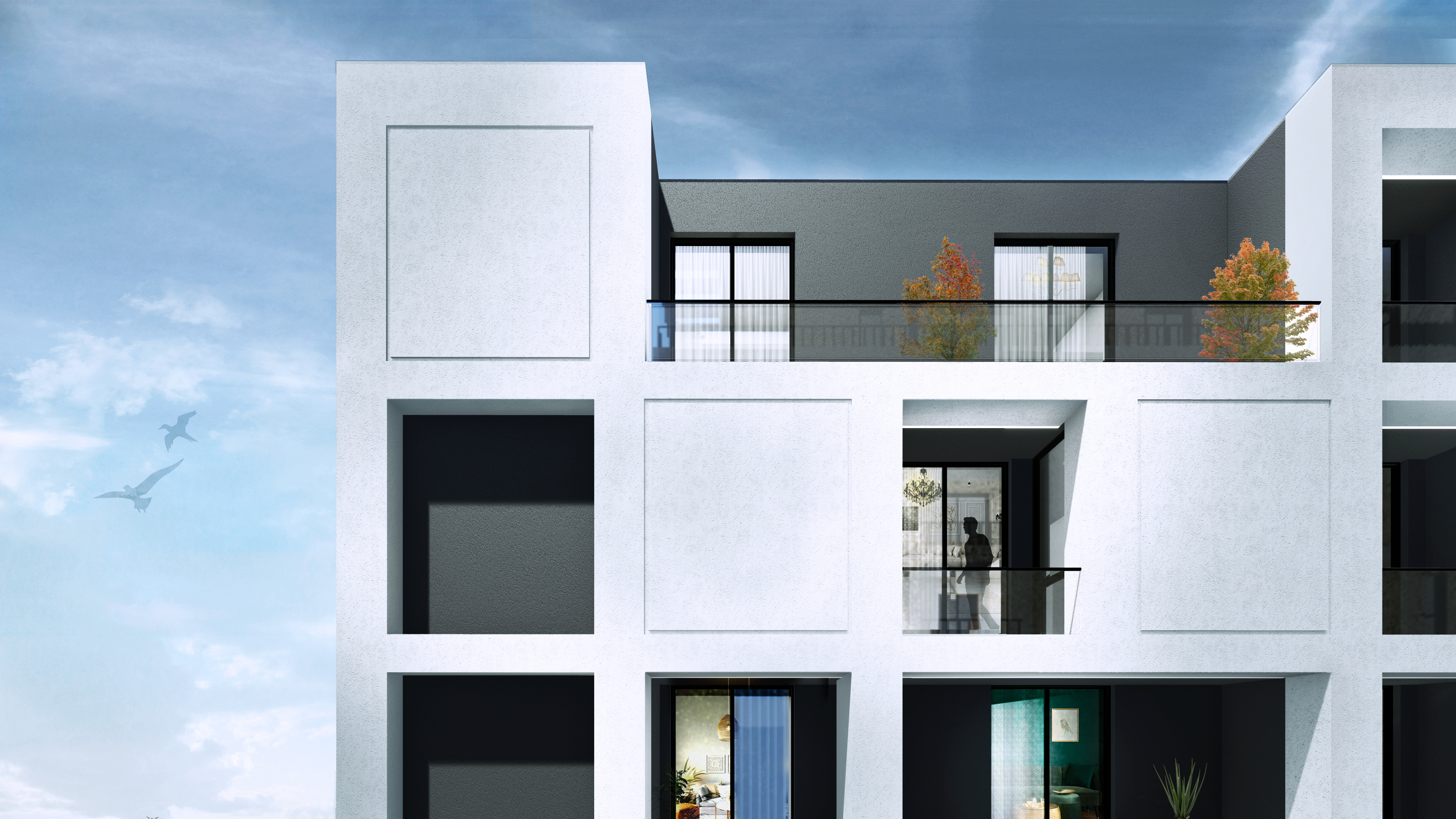 White gridded facade and balconies at Koi Residence, Tirana, framed by an autumn tree