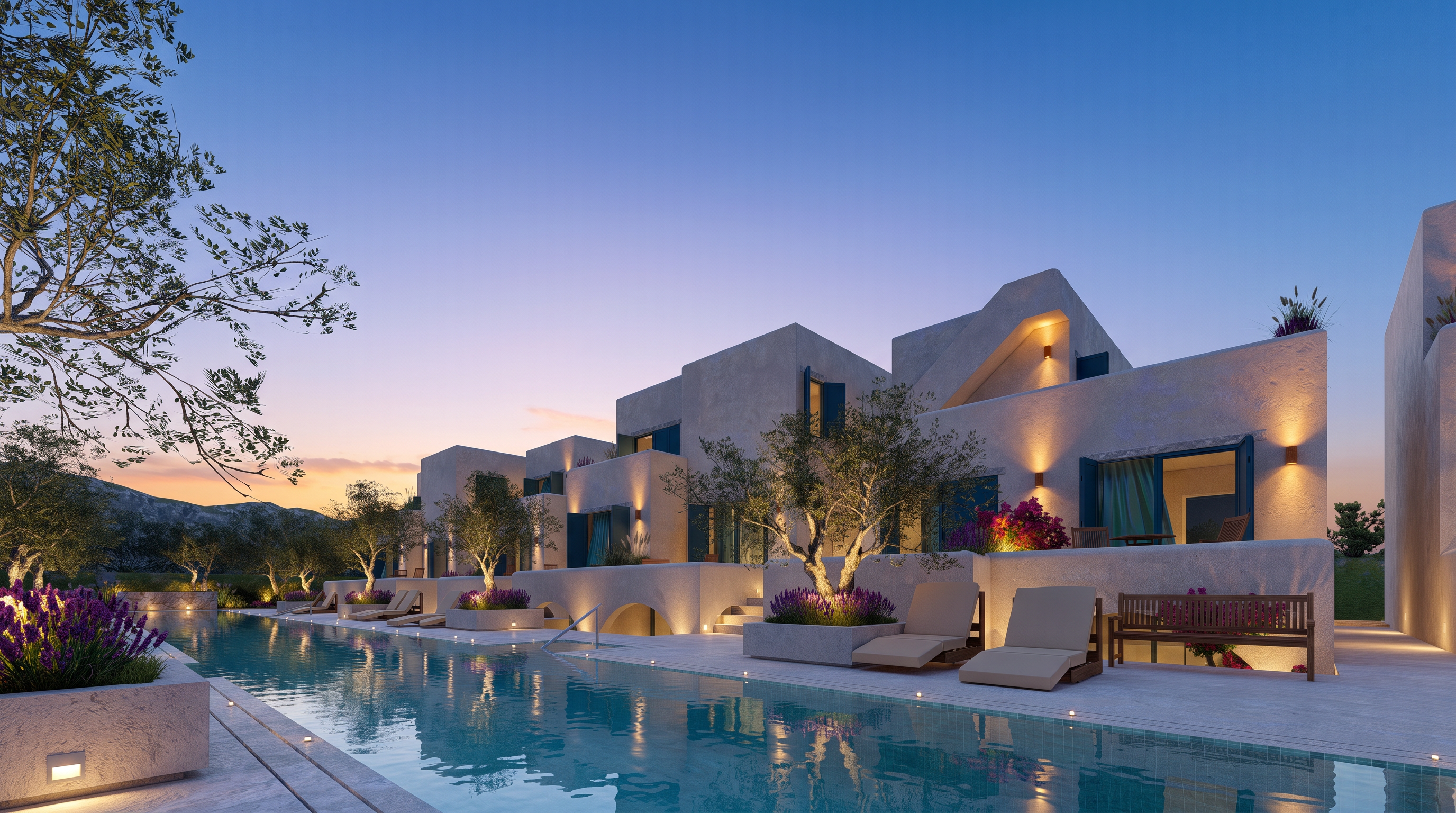 Aquamarine resort at Qeparo, an olive tree beside the pool under a violet evening sky